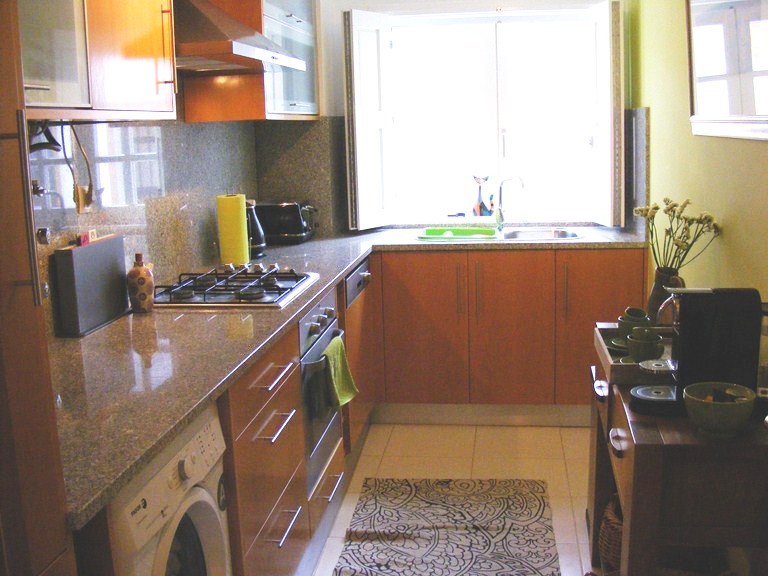 Large, fully equipped kitchen with granite worktop