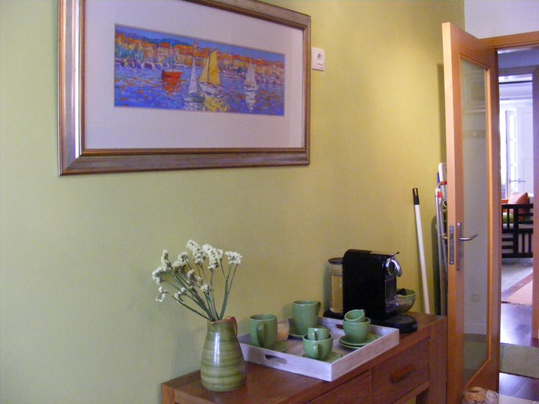 Coffee table in kitchen with Nespresso coffee machine