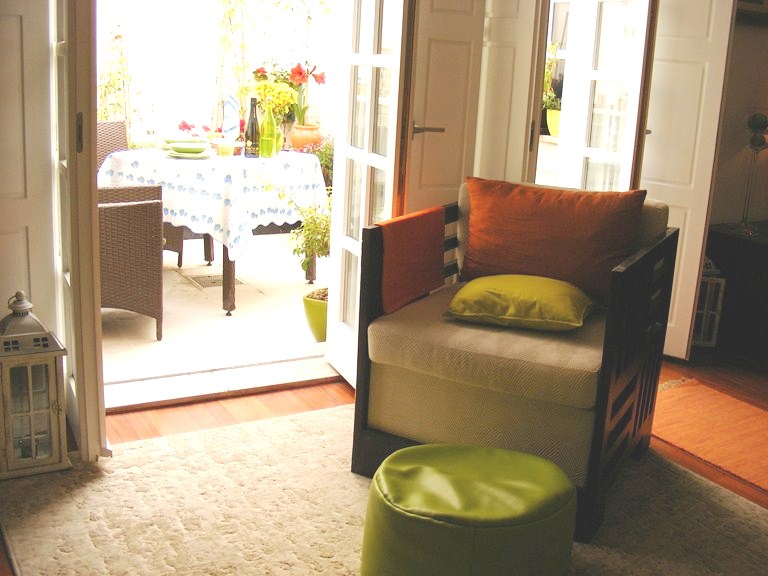 View from the living room towards the Patio area with table and chairs