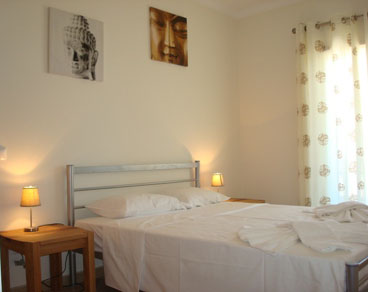 Light double bedroom with built in wardrobes