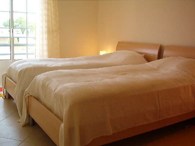 Double bedroom with plenty of wardrobe space, lots of light and sea view.