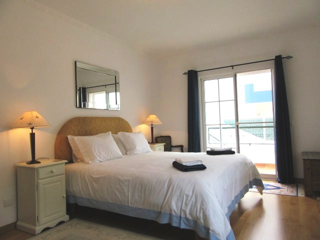 Master bedroom with walk-in dressing room and en-suite bathroom
