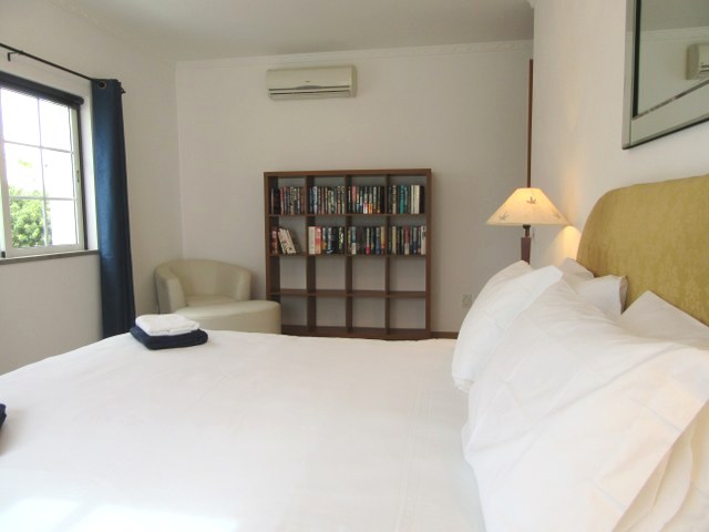 Master bedroom with walk-in dressing room and en-suite bathroom