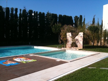 View of the pool and garden area