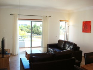Light and spacious living room with terrace