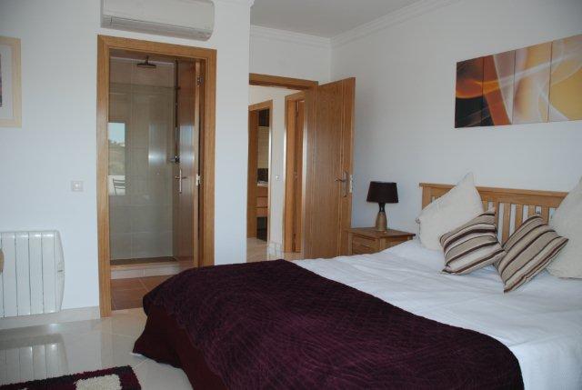 Spacious double bedroom with en suite bathroom